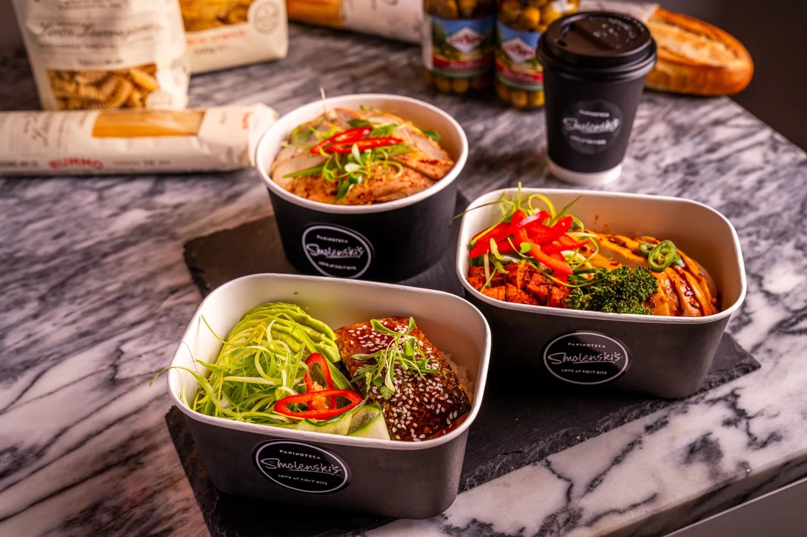 Fresh takeaway bowls with coffee at Smolenski’s