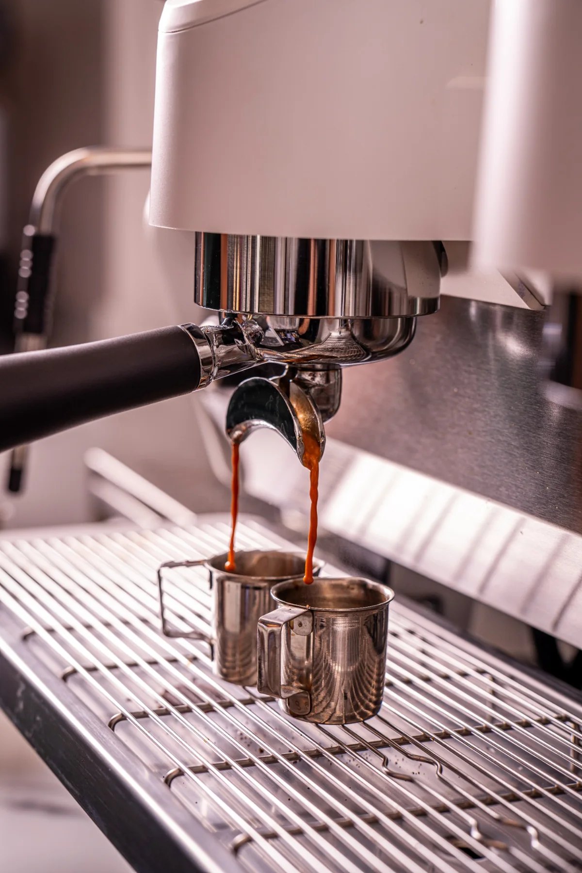 Espresso pouring from the coffee machine at Smolenski’s